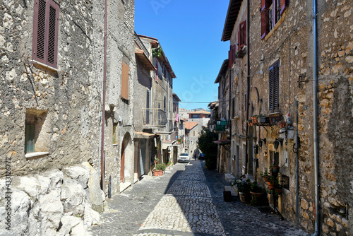 Sermoneta  Italy  05 10 2021. A street between old medieval stone buildings in the historic town.