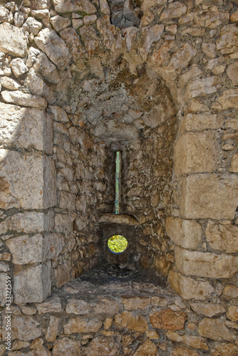 Sermoneta, Italy, 05/10/2021. Una apertura nel muro di un castello medievale della storica cittadina. photo