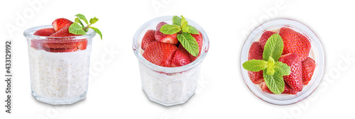 Fototapeta Naklejka Na Ścianę i Meble -  Oatmeal porridge with milk and fresh strawberries in a glass on a white isolated background