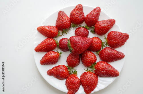 ripe strawberries on a plate
