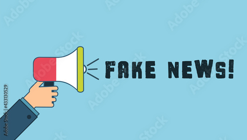 Hand holding megaphone with Fake News speech bubble. Loudspeaker. Banner for business and advertising. Vector illustration. © UKRAINIAN