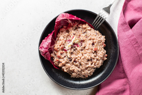 Bilde på lerret Italian risotto with red radicchio from Treviso, pancetta and taleggio cheese