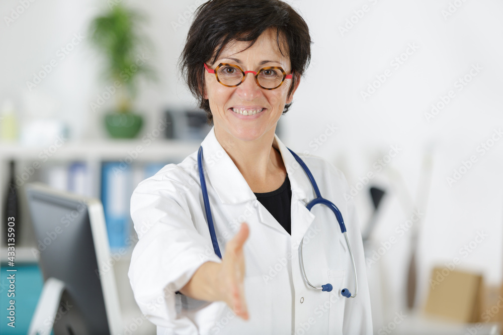 medical people handshaking at office medical people handshaking at office