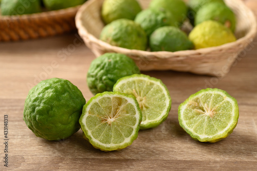 Fresh bergamot fruit on wooden table, Food ingredients and extract used for medicine, tea, perfumes and cosmetics