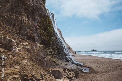 Alamere Falls, a rare tidefall on California coast photo