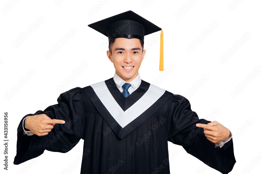 Happy Male graduate student pointing to something Happy Male graduate student pointing to something