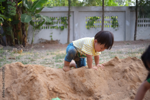 child playing on the beach