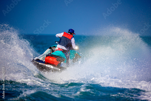A man driving a jet ski