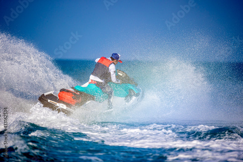 A man driving a jet ski