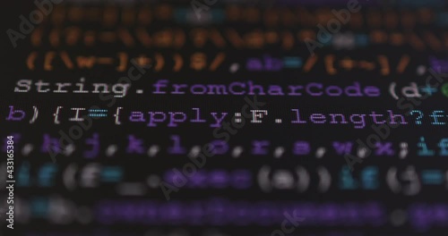 4K Close up shot programming tag code on PC Monitor scroll down. Background concept for programming and coding web development.