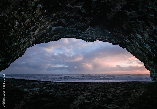 Cave on beach sunset © Dannie