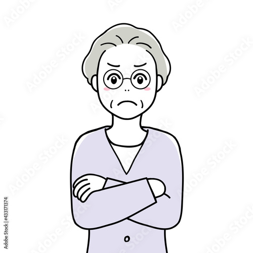 An angry senior woman with her arms crossed