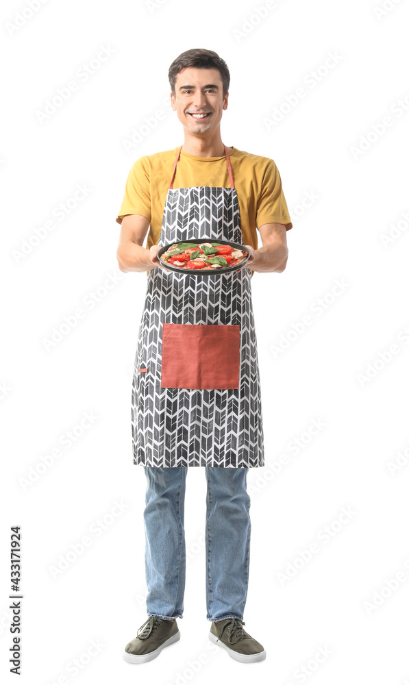 Young man with tasty pizza on white background Young man with tasty pizza on white background