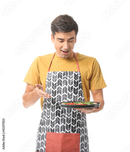 Young man with tasty pizza ...