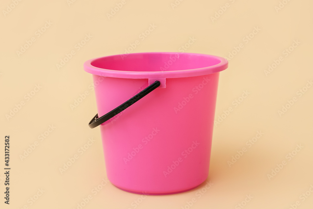 Plastic bucket on color background Plastic bucket on color background
