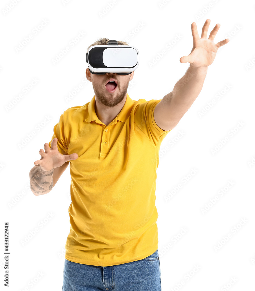 Young man with VR glasses on white background Young man with VR glasses on white background