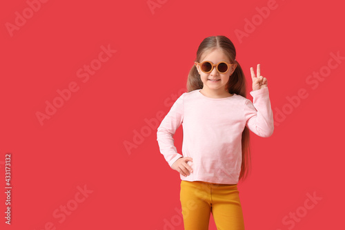 Cute little girl wearing st...