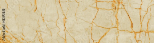 beige onyx marble texture with brown veins.