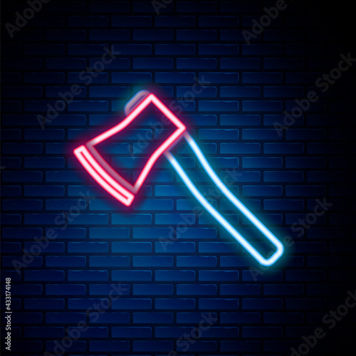 Glowing neon line Wooden axe icon isolated on brick wall background. Lumberjack axe. Colorful outline concept. Vector