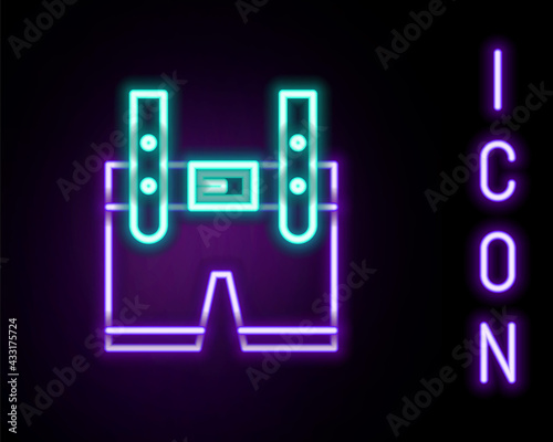 Glowing neon line Lederhosen icon isolated on black background. Traditional bavarian clothing. Oktoberfest outfit. Pants with suspenders. Patrick day. Colorful outline concept. Vector