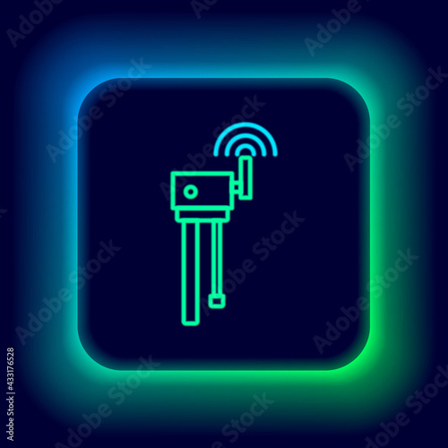 Glowing neon line Router and wi-fi signal symbol icon isolated on black background. Wireless ethernet modem router. Computer technology internet. Colorful outline concept. Vector