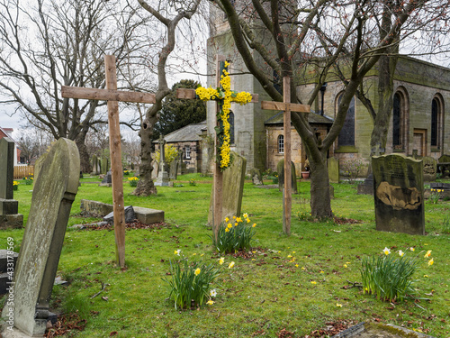 Easter crosses in churchyard with decoration, UK