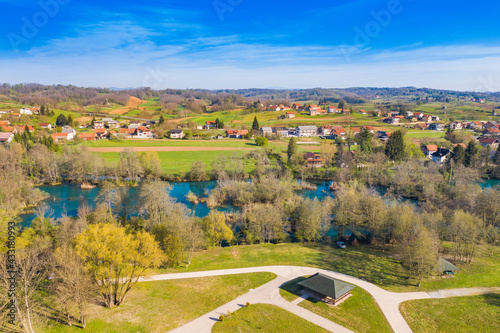 Beautiful green countryside landscape, Mreznica river in Belavici village from air, Croatia