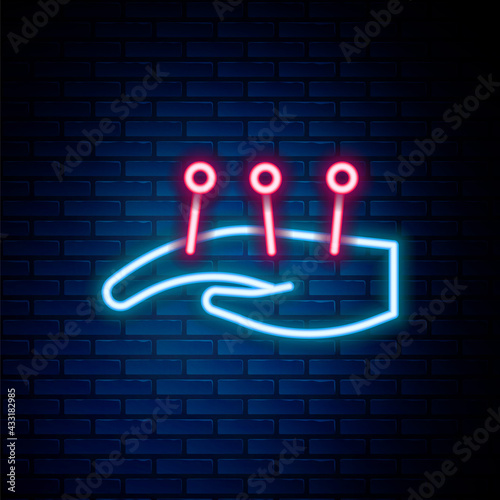 Glowing neon line Acupuncture therapy on the hand icon isolated on brick wall background. Chinese medicine. Holistic pain management treatments. Colorful outline concept. Vector