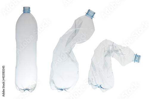 Evolution plastic bottles crushed and recycled. The photo shows a symbolic process for plastic recycling. Plastic bottles are thrown away all over the world and they have begun to pollute the planet. 