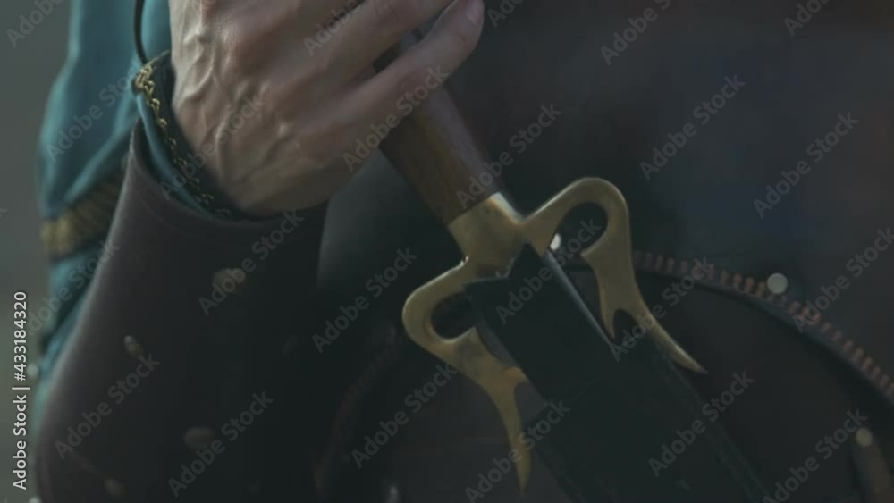 Beautiful woman holds a sword. warrior soldier slow motion