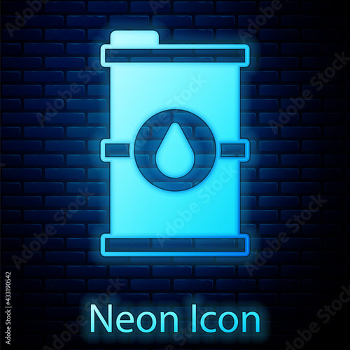 Glowing neon Bio fuel barrel icon isolated on brick wall background. Eco bio and canister. Green environment and recycle. Vector