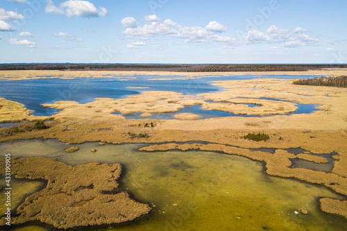 Aerial view of Kanieris lake in sunny spring day  Latvia