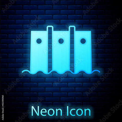 Glowing neon Hydroelectric dam icon isolated on brick wall background. Water energy plant. Hydropower. Hydroelectricity. Vector