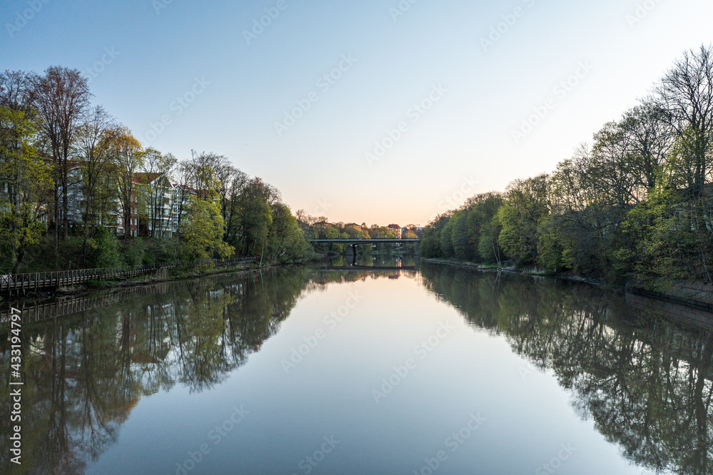 Calm river at dawn in springtime