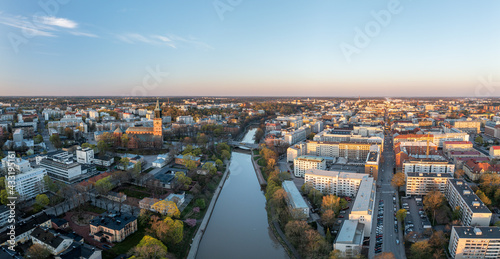 Aerial panorama of Turku city center, Cathedral of Turku and Aura river in spring in Finland. photo