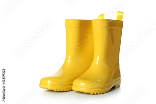 Yellow rubber boots isolated on white background photo