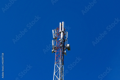 Mobile tower 5G against the blue sky