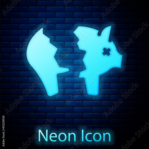 Glowing neon Broken piggy bank icon isolated on brick wall background. Icon saving or accumulation of money, investment. Vector
