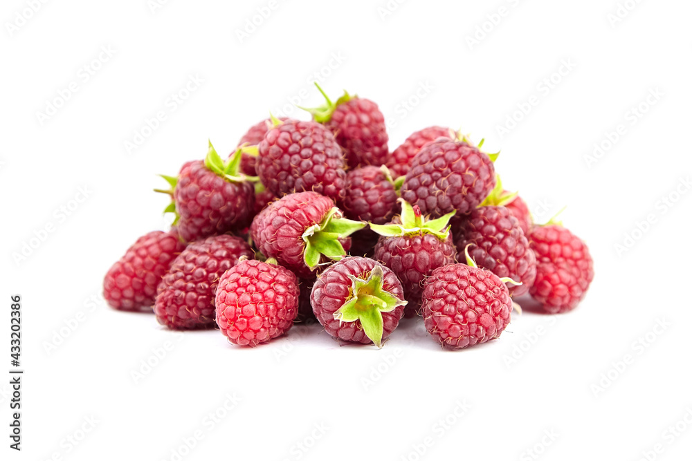 Raspberries with green leaves isolated on white background. Heap of red raspberries, sweet summer berries Raspberries with green leaves isolated on white background. Heap of red raspberries, sweet summer berries