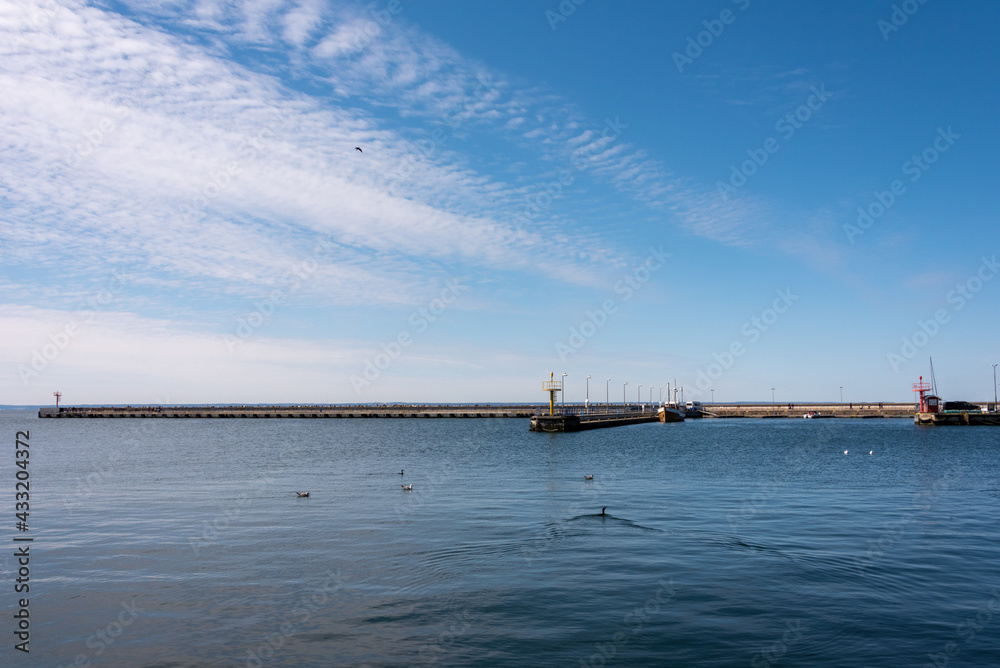 Harbor under blue sky in Hel, Pomerania, Poland. Selective focus. 