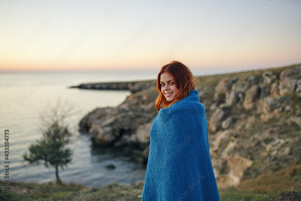 red-haired woman with blue plaid outdoors travel fresh air red-haired woman with blue plaid outdoors travel fresh air