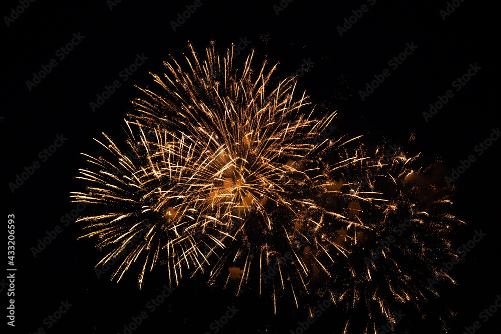 Festive fireworks in the dark night sky Festive fireworks in the dark night sky