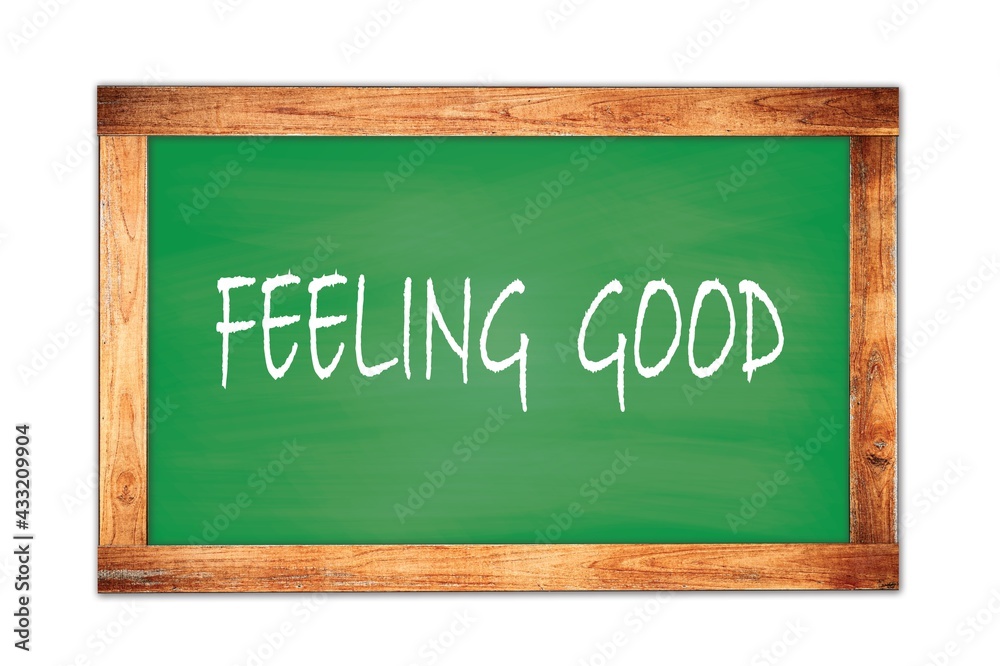 FEELING GOOD text written on green school board. FEELING GOOD text written on green school board.