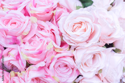 Close up of many fabric pale pink roses with blurred  background as Valentine   s day concept.