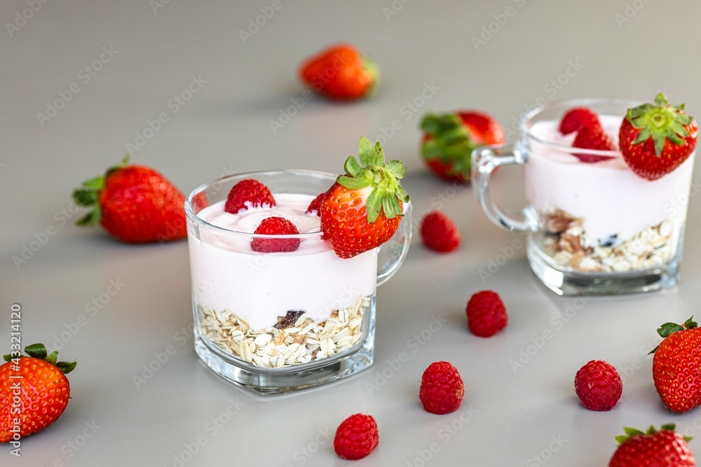 Delicious strawberry and raspberry yogurt with cereals