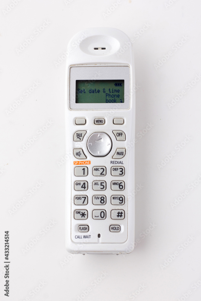 White Cordless desk phone isolated on a white background. White Cordless desk phone isolated on a white background.