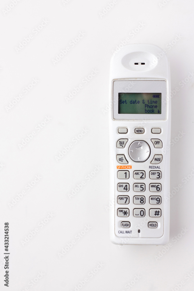 White Cordless desk phone isolated on a white background. White Cordless desk phone isolated on a white background.