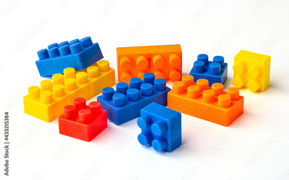 Many color square puzzle toys isolated on a white background. Many color square puzzle toys isolated on a white background.