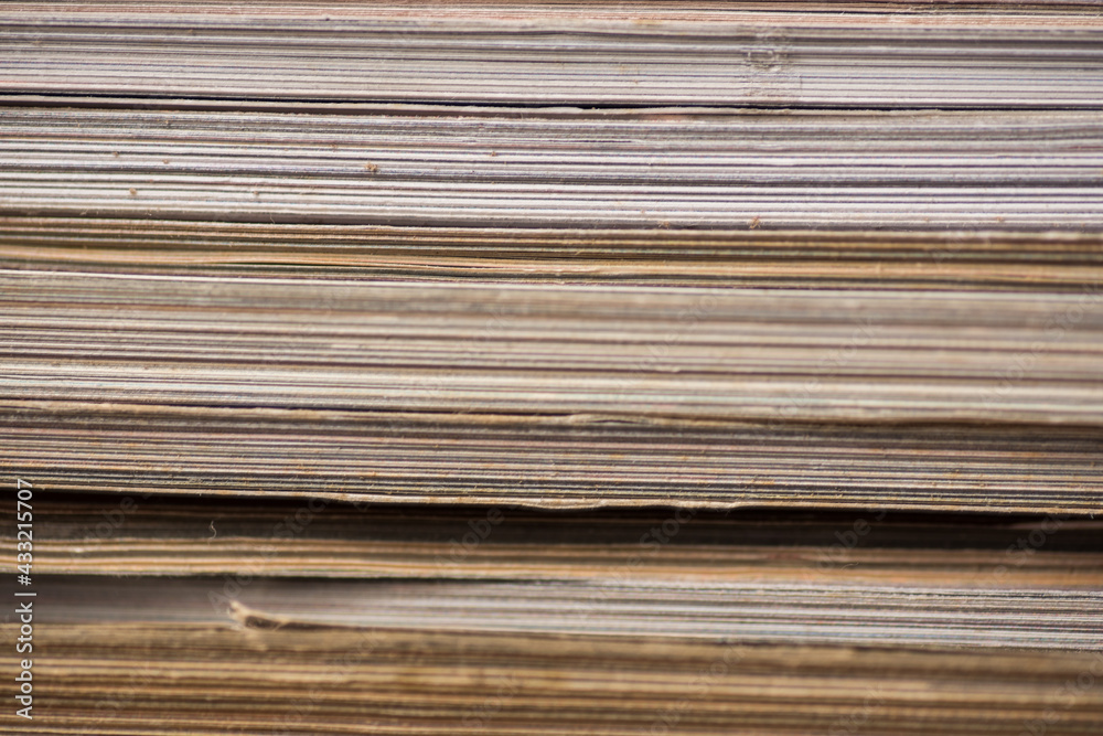 Close up shot of heap of magazines on top of each other Close up shot of heap of magazines on top of each other