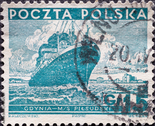 POLAND-CIRCA 1935 : A post stamp printed in Poland showing an ocean liner Different Sights - President Ignacy Moscicki, 1867-1946 photo